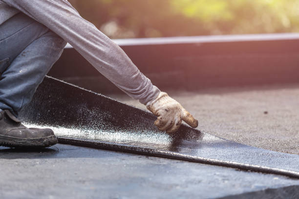 Professional Interior Drainage System technician working in Robins, IA